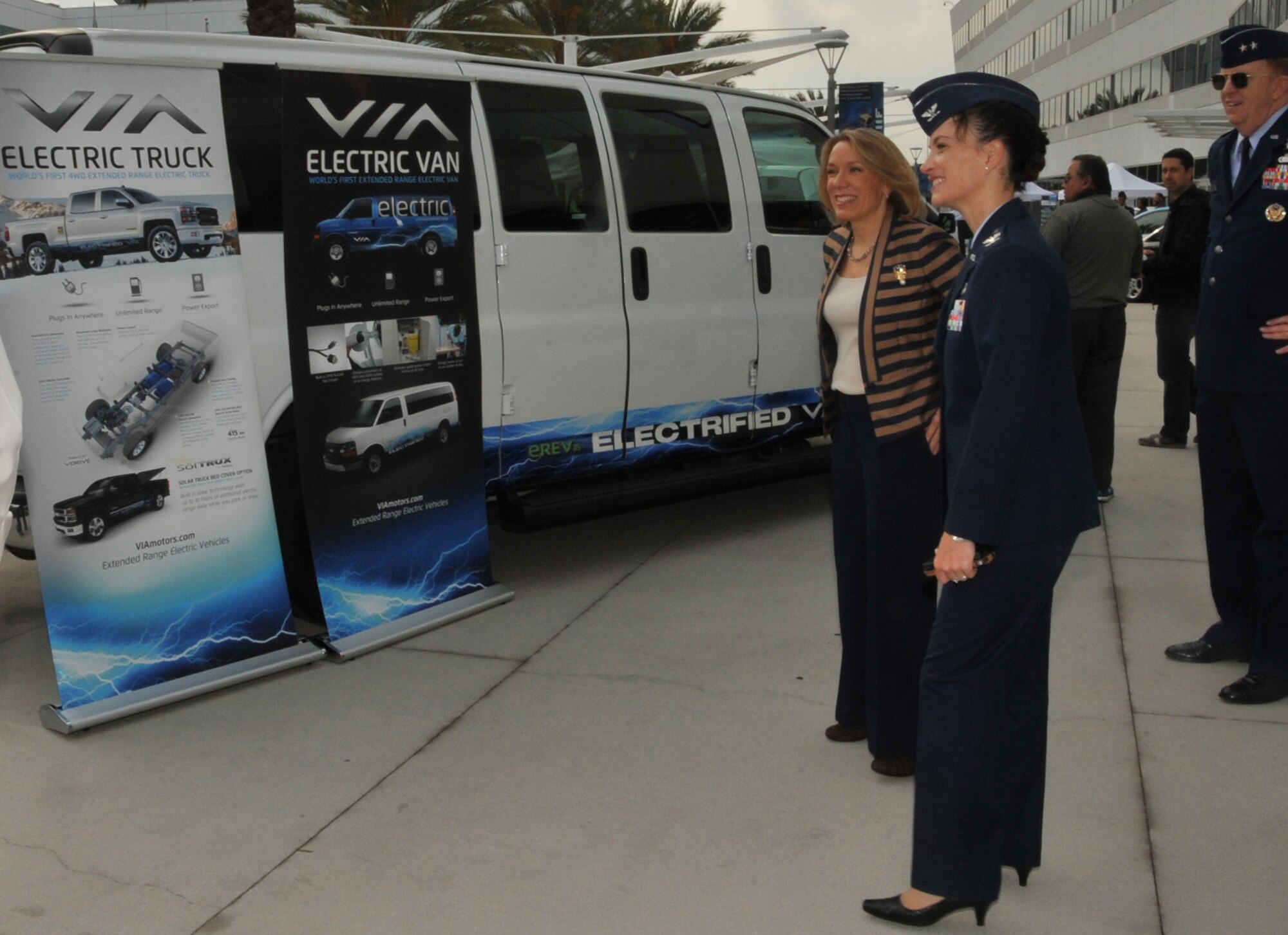 Assistant Secretary of the Air Force for Installations, Environment and Energy Miranda Ballentine visits LAAFB for the unveiling of the base's the plug-in electric vehicle fleet, Nov 14. She is joined by SMC Vice Commander Maj. Gen. Robert McMurry and 61st Air Base Group Commander Col. Donna Turner in viewing the displays of the vehicles and charging systems.  The all-electric/hybrid fleet is the first of its kind in the Department of Defense and will serve as a year-long test for potential expansion throughout DoD.  (Photo by Sarah Corrice)
