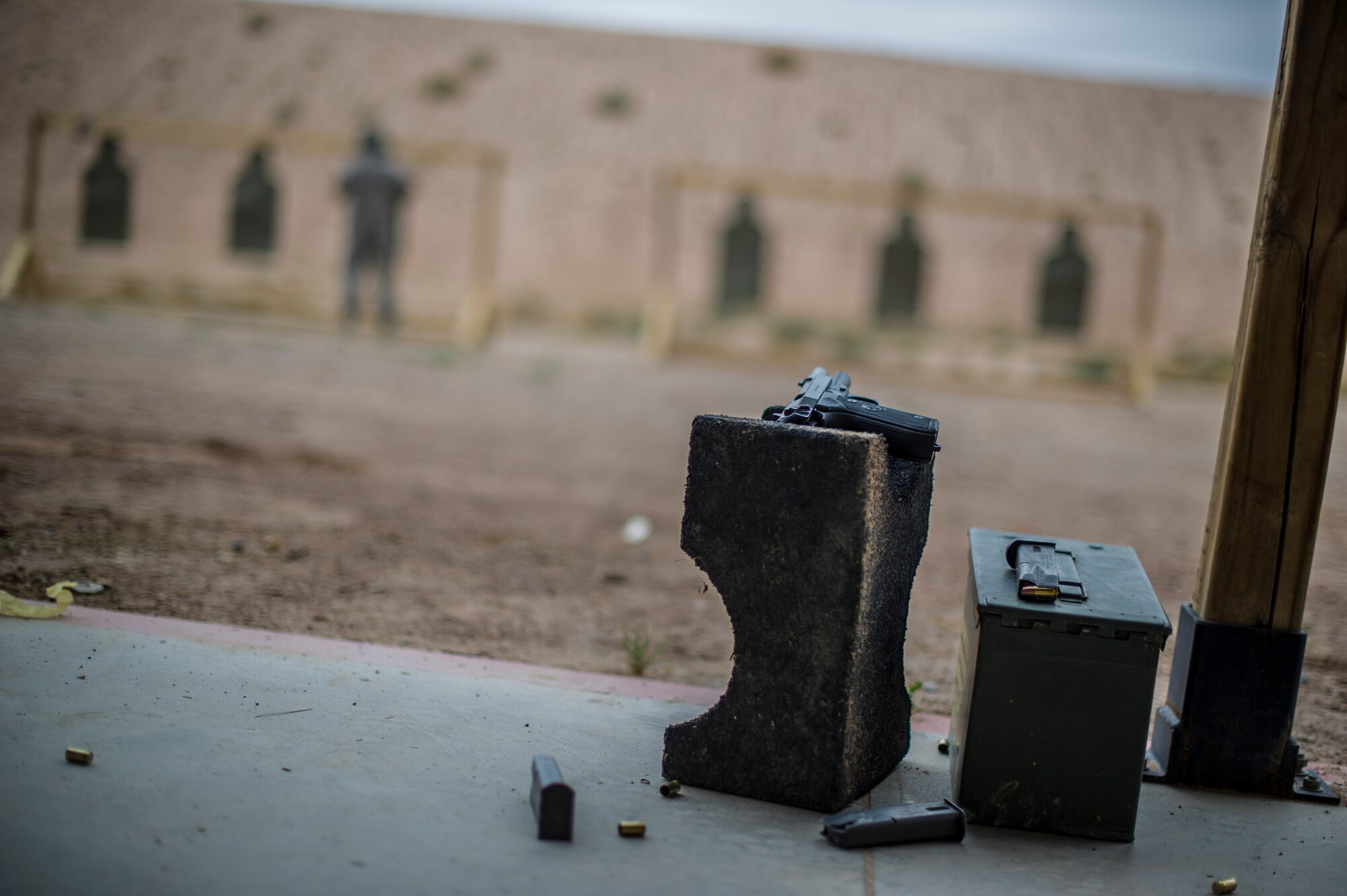 Members from the 49th Security Forces Squadron and the German Air Force participate in a shooting event at Holloman Air Force Base, N.M., Nov. 12. The Airmen came together to shoot the German G36 Assault Rifle the P8 Pistol, the American M-4 Rifle and M-9 Pistol. Both countries shot in hopes to receive each other’s marksmanship awards. The event also furthered the already established bond between the U.S. and German Air Force. (U.S. Air Force photo by Airman 1st Class Aaron Montoya /released)   

