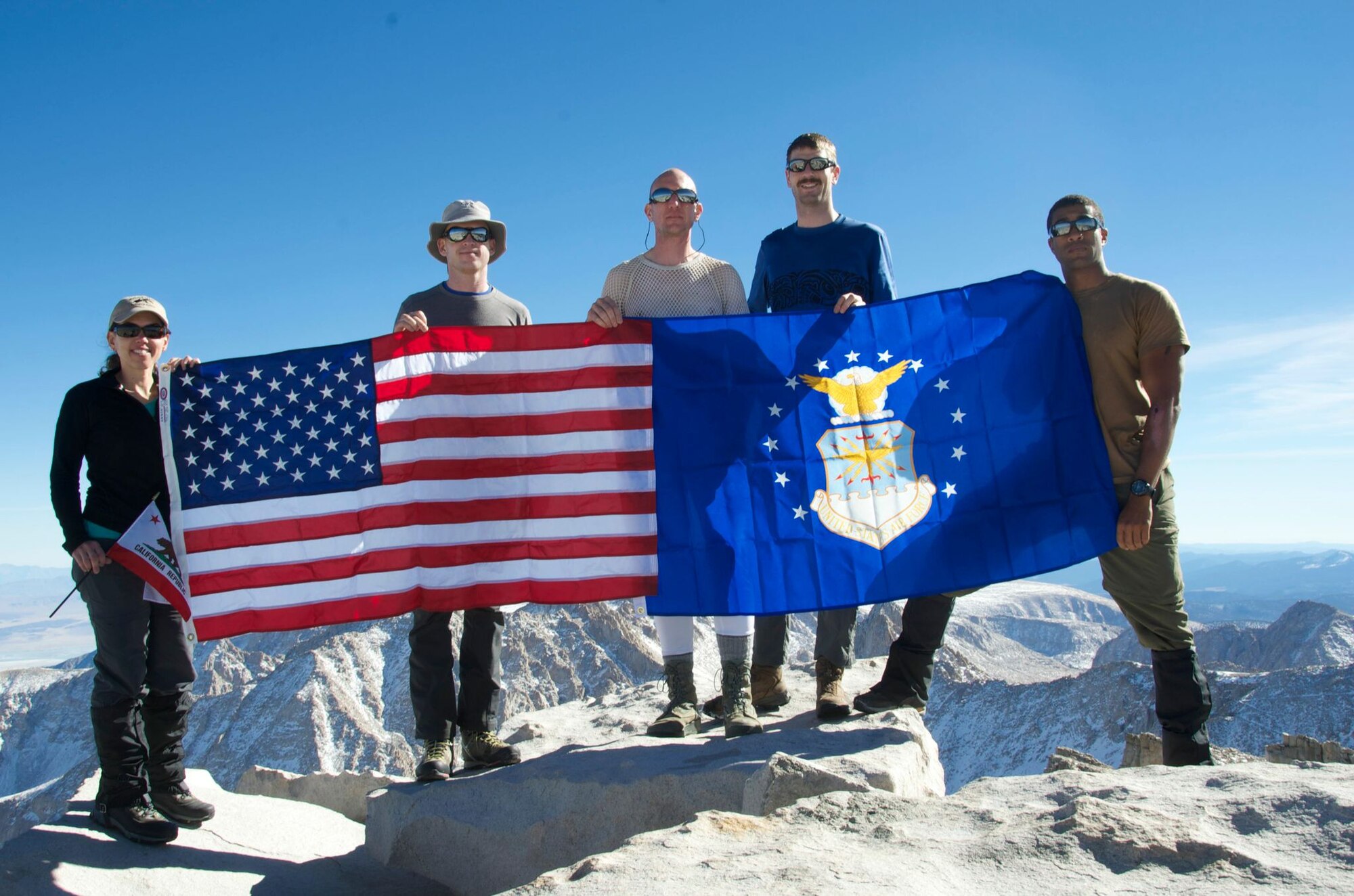 The Mount Whitney climbing team, left to right: Dawn Golding, Naval Amphibious Base Coronado, Calif., Maj. Chris Hubbard, U.S. Air Force Academy, Maj. Tavis McDevitt, Moffett Federal Airfield, Calif., Maj. Graydon Muller, Naval Postgraduate School, Monterey, Calif., and Staff Sgt. Ed Drew, Moffett Federal Airfield, at the top of Mt. Whitney. 