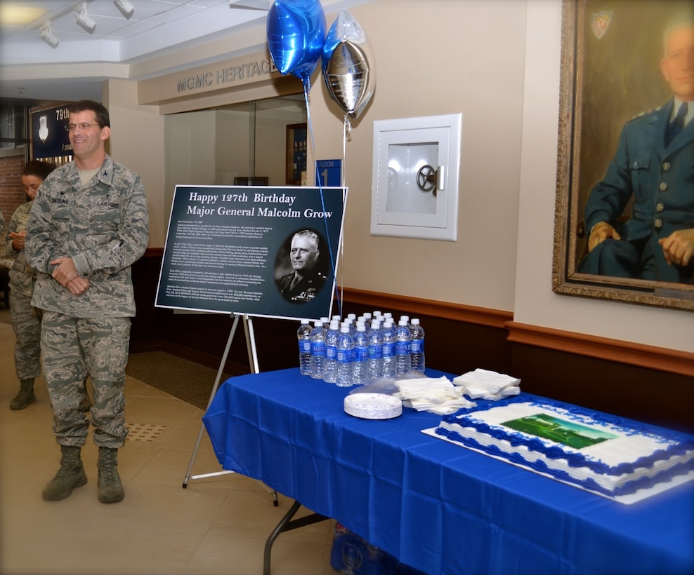 Colonel Thomas Cantilina, 779th Medical Group Commander welcomed guests on Wed., Nov. 19 to a historical birthday party. Malcolm Grow Medical Clinics and Surgery Center held a 127th birthday celebration to remember General Malcolm C. Grow who the medical facility is named for. The celebration was held in the main entrance, near the Malcolm Grow showcase. General Grow was the first surgeon general of the U.S. Air Force (July 1, 1949 - Nov. 30, 1949). (AF Photo by Master Sgt. Aimee Klarmann) 