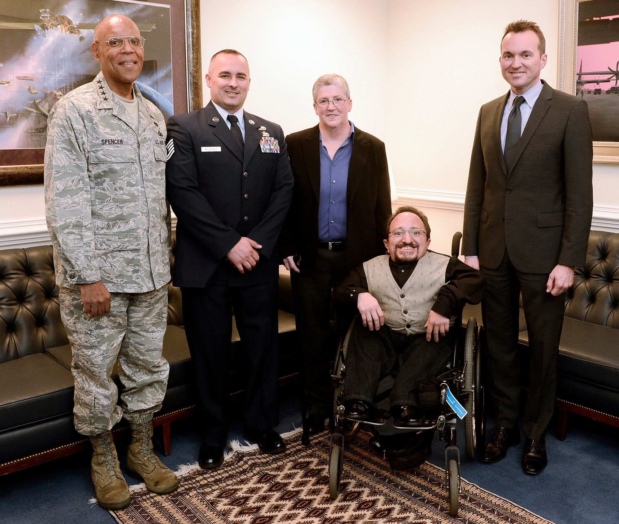 Air Force Vice Chief of Staff Gen. Larry Spencer and Under Secretary of the Air Force Eric Fanning stand with three of the 2014 Department of Defense Disability Awards recipients Oct. 30, 2014, at the Pentagon. The recipients are Tech. Sgt. Chad Molenhour, from the 552nd Air Control Wing, Tinker Air Force Base, Okla.; Kathi Duncan, from Wright-Patterson AFB, Ohio; and Chris Gitto, from Kirtland AFB, N.M. The DOD Disability Awards ceremony honors service components for outstanding achievements in the hiring, retention and advancement of individuals with disabilities. (U.S. Air Force photo/Andy Morataya)