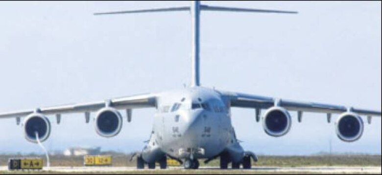 C-17 (shown) and C-130 aircraft will be used for the transport isolation system. (Air Force photo)