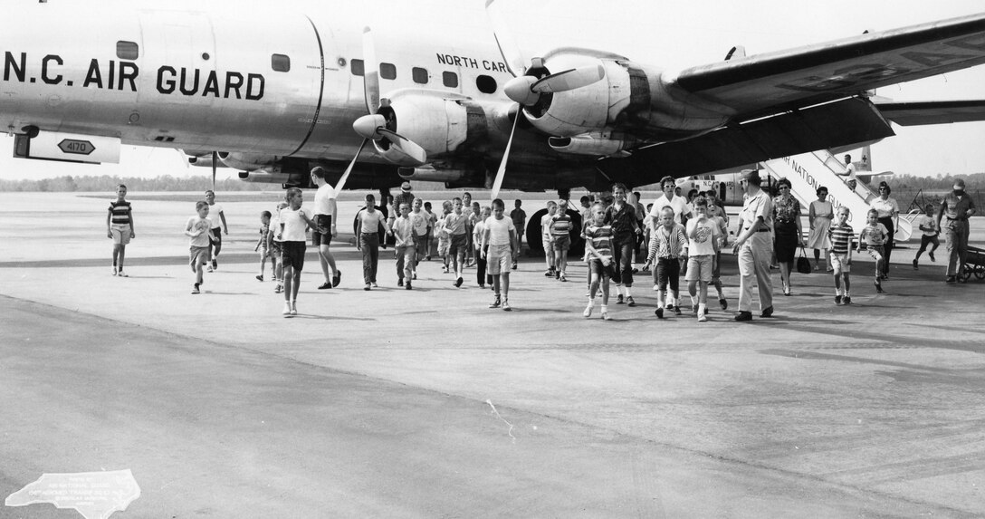 C-121 01 Jun 1962 - 06 Apr 1967; School Children Touring C-121 on Charlotte Ramp (Photo by NCANG Heritage Program)