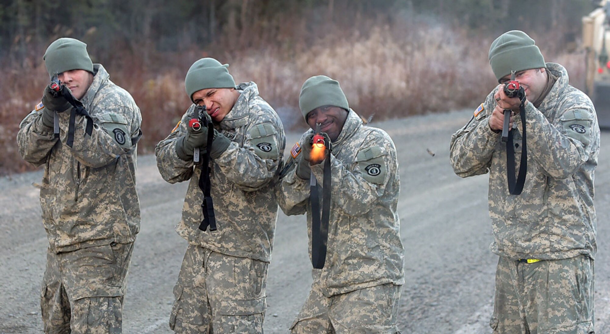 Soldiers assigned to U.S. Army Alaska's 109th Transportation Company attack a vehicle as an opposition force, Thursday, Nov. 13, 2014, on Joint Base Elmendorf-Richardson, Alaska, as part of a convoy training exercise. The soldiers also simultaneously executed react-to-ambush procedures with follow-on hasty and deliberate vehicle recovery operations. (U.S. Air Force photo/Justin Connaher)