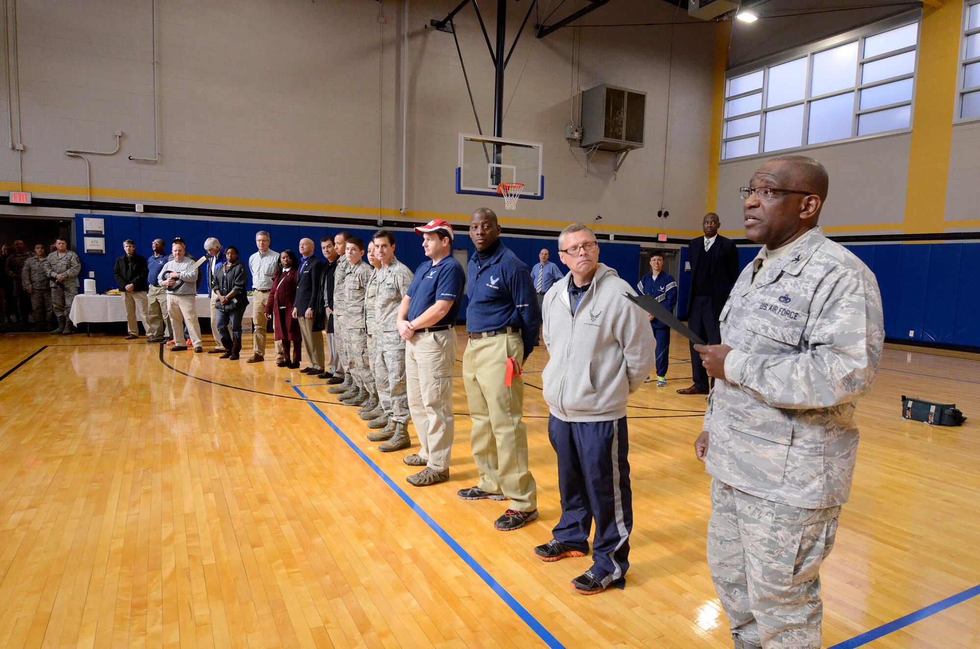 Col. Marshall Irvin, 94th Missions Support Group commander, recognizes those that helped bring the renovated fitness center to fruition at Dobbins Air Reserve Base, Ga. Nov. 18, 2014. The fitness center includes approximately 30 new pieces of equipment. (U.S. Air Force photo by Don Peek/Released)