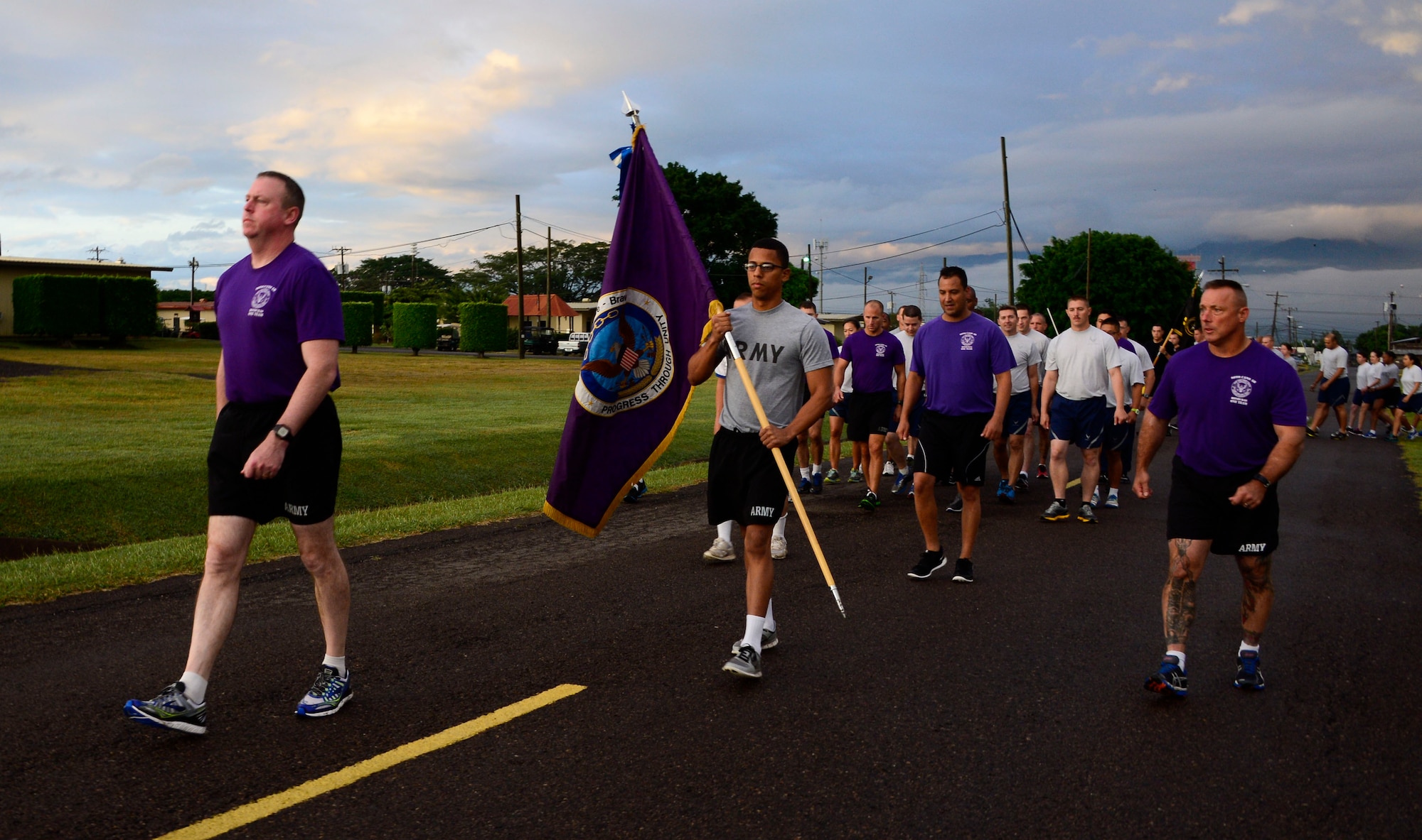 U.S. Army Col. Kirk Dorr, Joint Task Force-Bravo commander, leads the formation during the quarterly JTF-Bravo four-mile run at Soto Cano Air Base, Honduras, Nov. 21, 2014.  Once a quarter JTF-Bravo holds a formation run to encourage esprit de corps and physical fitness. (U.S. Air Force photo/Tech. Sgt. Heather Redman)
