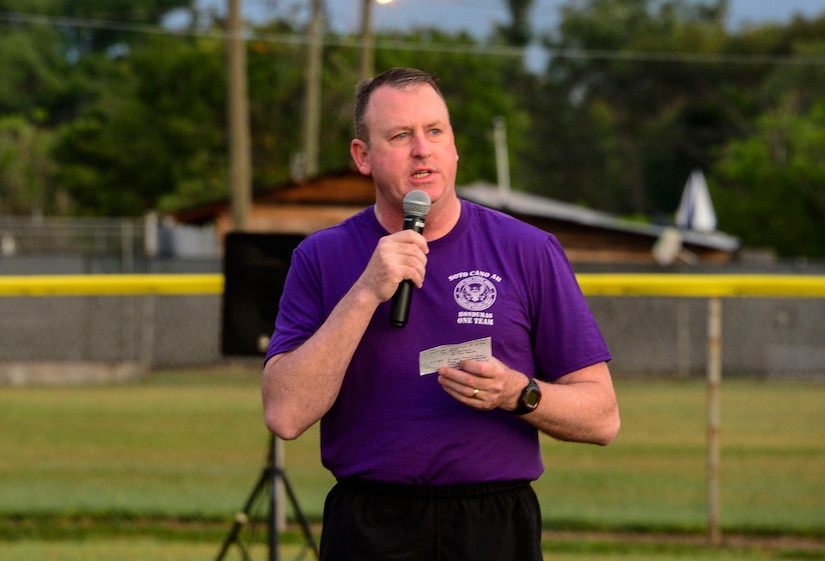 U.S. Army Col. Kirk Dorr, Joint Task Force-Bravo commander, welcomes all the organizations to the quarterly JTF-Bravo four-mile run at Soto Cano Air Base, Honduras, Nov. 21, 2014.  Once a quarter JTF-Bravo holds a formation run to encourage esprit de corps and physical fitness. (U.S. Air Force photo/Tech. Sgt. Heather Redman)