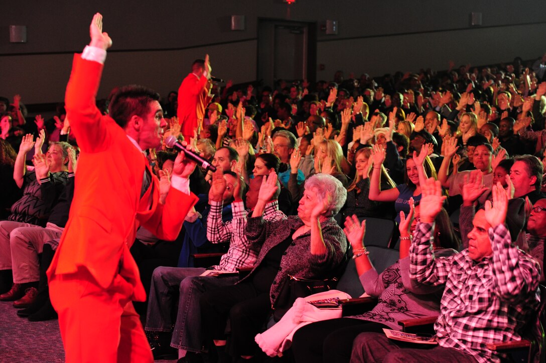 The U.S. Air Force performance unit, Tops In Blue, performs at Joint Base Andrews, Md., Nov. 14, 2014. The group performed a song from the musical group The Village People for a fully packed audience at the base theater as part of their annual tour. The audience took part in the coreography for the popular song, "Y.M.C.A." (U.S. Air Force photo/Airman 1st Class Joshua R. M. Dewberry) 