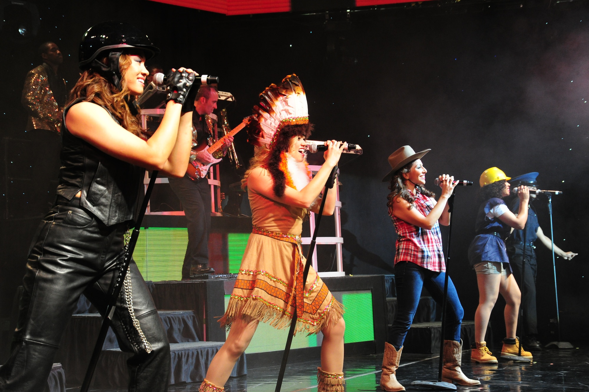 The U.S. Air Force performance unit, Tops In Blue, performs at Joint Base Andrews, Md., Nov. 14, 2014. The group performed a song from the musical group The Village People for a fully packed audience at the base theater as part of their annual tour. (U.S. Air Force photo/Airman 1st Class Joshua R. M. Dewberry) 