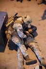 Staff Sgt. Jarrid Wrege, 341st Security Forces Group Tactical Response Force member, apprehends a suspect during an active shooter training exercise at Malmstrom Air Force Base, Mont., Nov. 18. Throughout their careers, TRF Airmen will continue to train within their specialties and hone their skills as assaulters, breachers and snipers. (U.S. Air Force photo/Airman 1st Class Joshua Smoot)