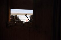 341st Security Forces Group Tactical Response Force Flight 911 team members move to their designated breach point during a training exercise at Malmstrom Air Force Base, Mont. Nov. 18. During the training exercise, members practiced breaching and assaulting. (U.S. Air Force photo/Airman 1st Class Joshua Smoot)