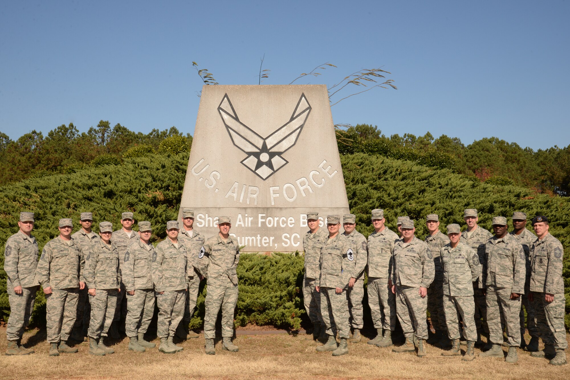 Chief master sergeant selects stand with members of the Team Shaw Chief’s Group in front of the Shaw sign at Shaw Air Force Base, S.C., Nov. 20, 2014, after the announcement of the chief promotion list. By congressional mandate, only one percent of the enlisted force attains the rank of chief, three selects were from Team Shaw. (U.S. Air Force photo by Airman 1st Class Jonathan Bass/Released)