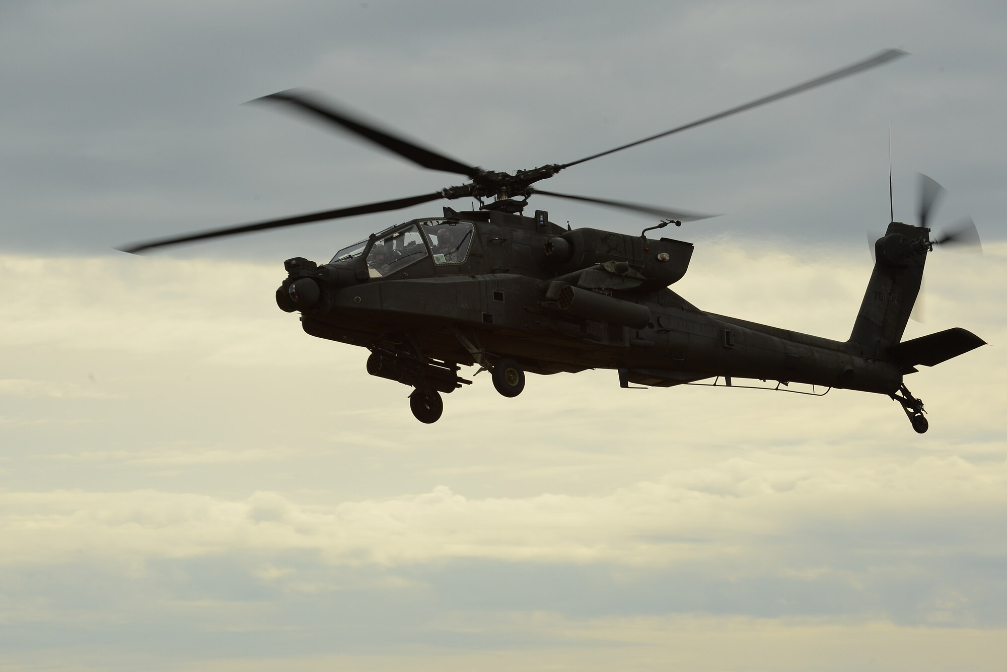 An AH-64 Apache assigned to the 1-130 Attack Recon Battalion, North Carolina Army National Guard, based at the Raleigh-Durham International Airport, trains at Poinsett Electronic Combat Range, Sumter, S.C., Nov. 13, 2014. Poinsett Range is open to the public for viewing the aircraft as they train. (U.S. Air Force photo by Airman 1st Class Diana M. Cossaboom/Released) 