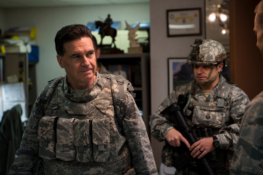 U.S. Air Force Brig. Gen. (Dr.) Sean Murphy, Air Combat Command surgeon general, tries on typical joint terminal air controller gear Nov. 19, 2014, at Moody Air Force Base, Ga. Murphy’s visit allowed him a personal look at the medical requirements to care for Moody’s battlefield Airmen. (U.S. Air Force photo by Airman 1st Class Ryan Callaghan/Released)