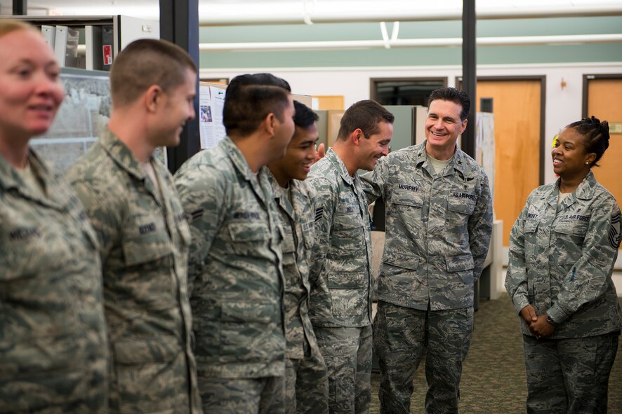 Airmen from the 23d Aerospace Medicine Squadron’s Bioenvironmental Engineering Flight speak with U.S. Air Force Brig. Gen. (Dr.) Sean Murphy, center, Air Combat Command surgeon general, and Chief Master Sgt. Bionca Lindsey, right, ACC Surgeon General Office medical enlisted force chief, Nov. 19, 2014, at Moody Air Force Base, Ga. Murphy visited Moody to familiarize himself with the 23d Medical Group’s personnel and operations, present awards and meet with commanders. (U.S. Air Force photo by Airman 1st Class Ryan Callaghan/Released)