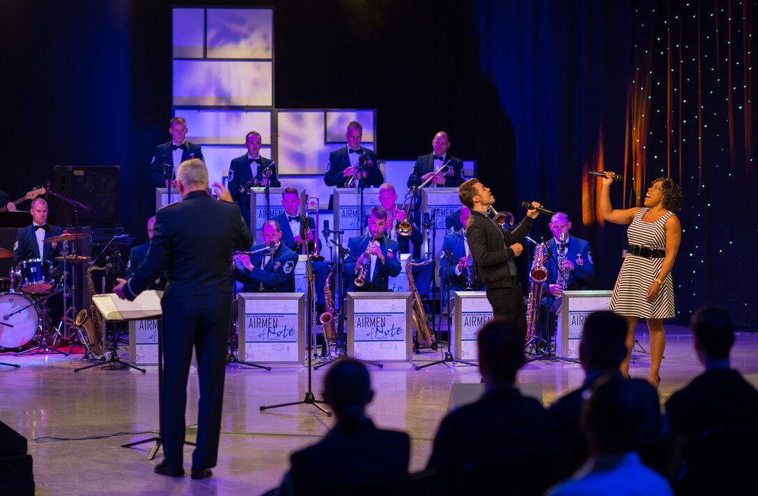 Kris Allen and Melinda Doolittle, stars from American Idol, joined the Air Force Band for a special Veterans Day Broadcast.  Colonel Lang led the ensemble for the performance, which aired on Maryland Public Television. (U.S. Air Force Photo/released)