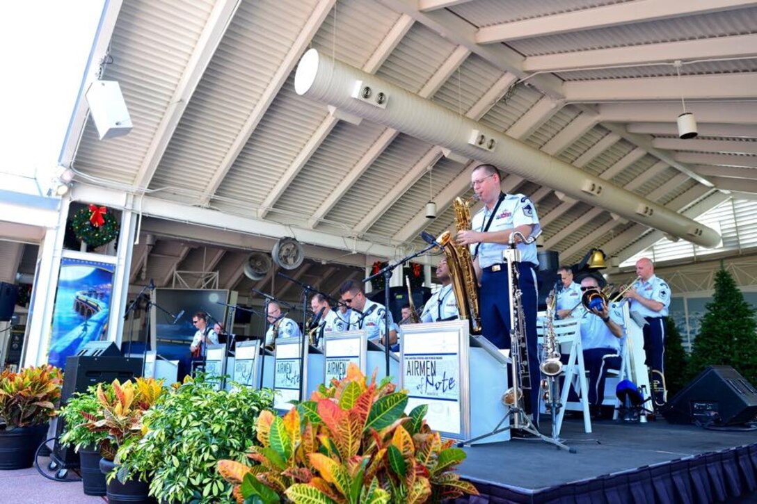 The Airmen of Note performed recently at SeaWorld Orlando as part of a week-long community relations tour of Florida.  Master Sergeant Doug Morgan solos with the group on baritone saxophone. (U.S. Air Force Photo/released)