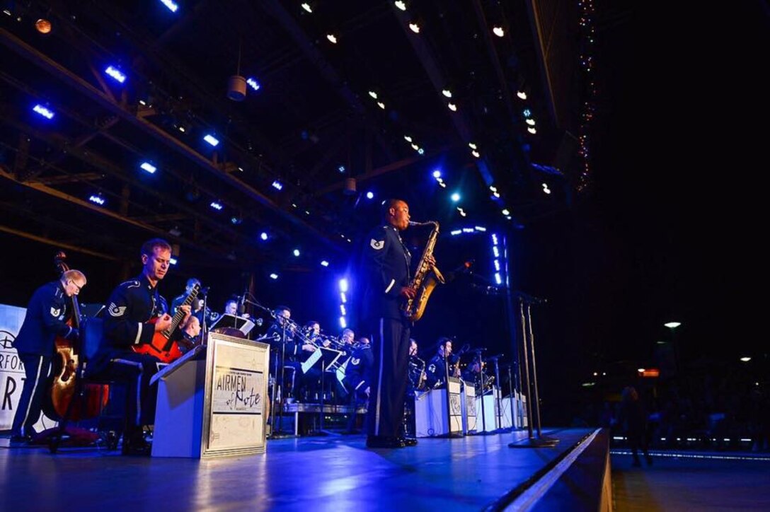 Technical Sergeant Grant Langford takes a solo with the Airmen of Note at their recent performance at Downtown Disney.  The performance was a part of a week-long community relations tour in Florida. (U.S. Air Force Photo by Master Sgt. Adam Dempsey)