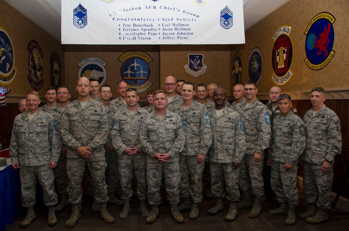 Chief master sergeants from Joint Base Charleston celebrate the promotion of Team Charleston’s newest chief master sergeant selects: (from left displaying their new rank) Senior Master Sgt. Troy Bauerback, 437th Airlift Wing Operations Support Squadron, Senior Master Sgt. Terrence Spradley, 437th AW Maintenance Squadron, Senior Master Sgt. Jason Heilman, 628th Air Base Wing Security Forces Squadron, Senior Master Sgt. Earl Wellman, 437th AW Maintenance Group, Senior Master Sgt. Christopher Papa, 628th ABW Logistics Readiness Squadron, Senior Master Sgt. Harold Vinson, 315th Airlift Wing Yellow Ribbon Program Representative, and Senior Master Sgt. Jeffrey Payne, 315th AW Aircraft Maintenance Squadron. Not pictured is Senior Master Sgt. Jayson Johnston. (U.S. Air Force Photo / Senior Airman Tom Brading)