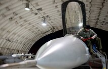 Senior Airman Benjamin Audet, 8th Aircraft Maintenance Squadron crew chief, performs preflight inspection on an F-16 Fighting Falcon before launching during Exercise Max Thunder 15-1 Nov. 18, 2014, Kunsan Air Base, Republic of Korea. U.S. Air Force, Army, Marine Corps and Navy personnel and aircraft are training alongside ROK air forces in the semi-annual, bilateral training event, which is the largest flying exercise held on the Korean Peninsula. (U.S. Air Force photo by Senior Airman Divine Cox/Released)