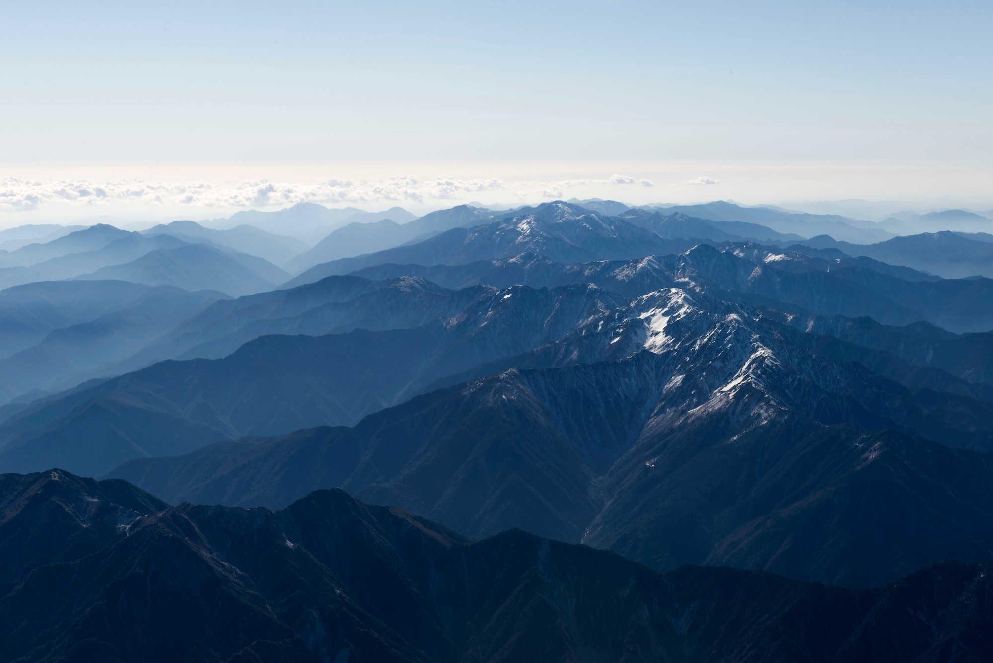 A mountain range is seen from the skies over South Korea during Exercise Max Thunder Nov. 19, 2014. Team Yokota took the exercise as an opportunity to reaffirm their commitment to the U.S.-Republic of Korea partnership and practiced their combat movement and response. (U.S. Air Force photo by Staff Sgt. Cody H. Ramirez/Released)