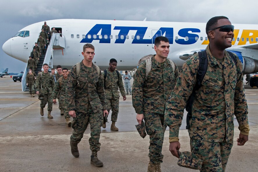More than 200 U.S. Marines arriving from Marine Corps Air Station Iwakuni, Japan, exit a Boeing 767 at Kunsan Air Base, Republic of Korea, Nov. 13, 2014. More than 1,000 personnel from various ROK air force units, the U.S. Navy, Marine Corps, Army and Air Force participated in Max Thunder 14-2, the largest biannual joint training exercise on the Korean Peninsula. (U.S. Air Force photo by Senior Airman Katrina Heikkinen/Released)