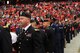 U.S. service members prepare to take the flag onto the field at Arrowhead Stadium in Kansas City, Mo., Nov 16, 2014. The entire flag covered the length of the Arrowhead Stadium. (U.S. Air Force photo by Airman 1st Class Jovan Banks/Released
