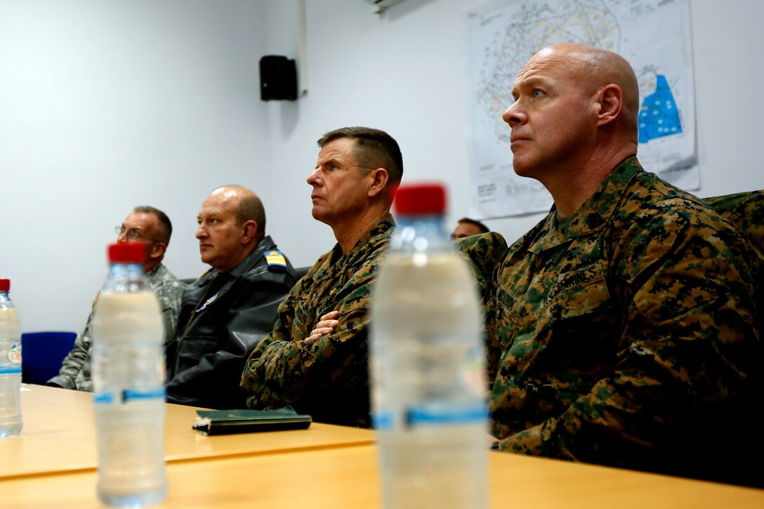 While visiting Mihail Kogalniceanu Air Base, Romania, Maj. Gen. William D. Beylder, commander of Marine Forces Africa and commanding general of II Marine Expeditionary Force, and Sgt. Maj. James McCook, the command sergeant major for Marine Forces Europe and Africa, meet with the Black Sea Support Team. The international and joint contingent of military servicemembers support MK to keep it the robust, operational hub for NATO Allies and U.S. European Command partners it is.