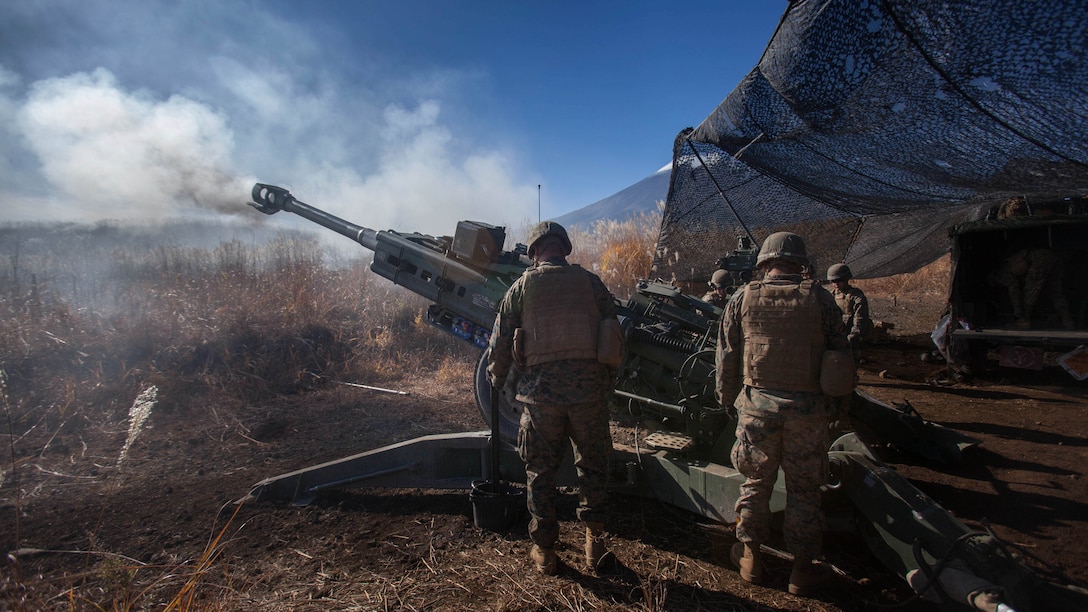 Marines fire an M777A2 lightweight 155 mm howitzer Nov. 4 at the North Fuji Maneuver Area during Artillery Relocation Training Program 14-3. ARTP is a regularly scheduled training event that increases and maintains combat readiness of U.S. Marine forces and supports the U.S.-Japan Treaty of Mutual Cooperation and Security. The Marines are with Battery B, 1st Battalion, 12th Marine Regiment based out of Kaneohe Bay, Hawaii, and are currently assigned to 3rd Battalion, 12th Marines, 3rd Marine Division, III Marine Expeditionary Force under the Unit Deployment Program.