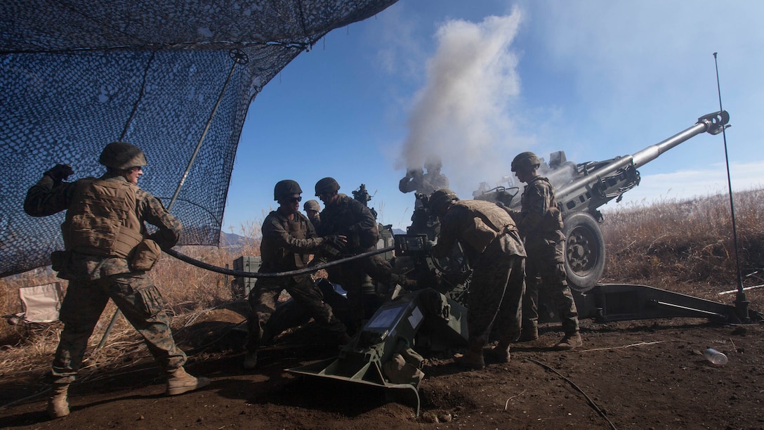 Marines load an M777A2 lightweight 155 mm howitzer Nov. 4 at the North Fuji Maneuver Area during Artillery Relocation Training Program 14-3. ARTP is a regularly scheduled training event that strengthens combat readiness of U.S. Marine forces, and supports the U.S.-Japan Treaty of Mutual Cooperation and Security. The Marines are with Battery B, 1st Battalion, 12th Marine Regiment based out of Kaneohe Bay, Hawaii, and are currently assigned to 3rd Battalion, 12th Marines, 3rd Marine Division, III Marine Expeditionary Force under the Unit Deployment Program. 