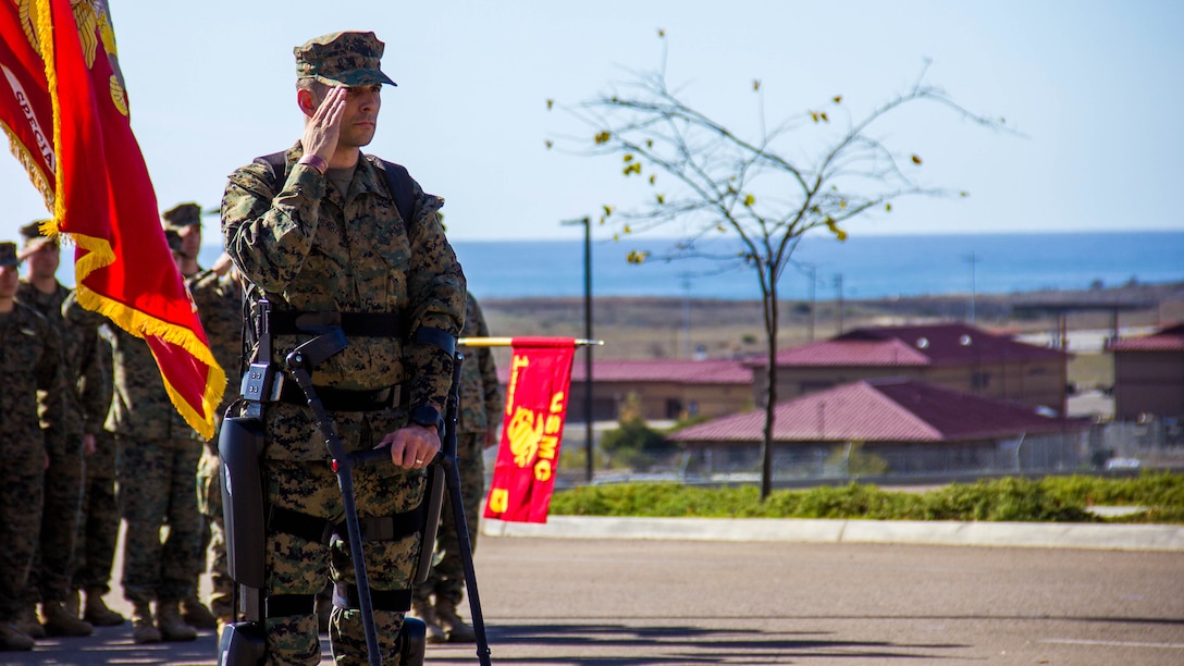 Captain Derek Herrera, a special operations officer with 1st Marine Special Operations Battalion, renders a salute as the national anthem is played during a retirement ceremony aboard Camp Pendleton, Calif., Nov. 21. Herrera medically retired from the Marine Corps after eight years of service. He was also awarded the Bronze Star Medal with combat V for heroism for his actions in Helmand province, Afghanistan.