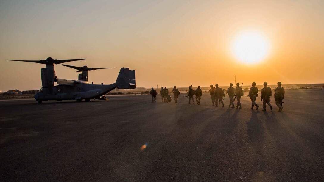 U.S. Marines with 2nd Battalion, 7th Marine Regiment, Special Purpose Marine Air Ground Task Force - Crisis Response - Central Command, prepare to board MV-22B Ospreys from Marine Medium Tiltrotor Squadron 363, SPMAGTF-CR-CC, during a Tactical Recovery of Aircraft and Personnel rehearsal drill in the U.S. Central Command area of operations, Oct. 25, 2014. The Marines and sailors of SPMAGTF-CR-CC serve as an expeditionary, crisis-response force tasked with supporting operations, contingencies and security cooperation in Marine Corps Forces Central Command and CENTCOM. 
