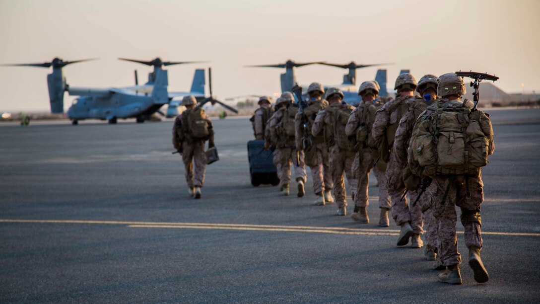 U.S. Marines with 2nd Battalion, 7th Marine Regiment, Special Purpose Marine Air Ground Task Force - Crisis Response - Central Command, prepare to board MV-22B Ospreys from Marine Medium Tiltrotor Squadron 363, SPMAGTF-CR-CC, during a Tactical Recovery of Aircraft and Personnel rehearsal drill in the U.S. Central Command area of operations, Oct. 25, 2014. The Marines and sailors of SPMAGTF-CR-CC serve as an expeditionary, crisis-response force tasked with supporting operations, contingencies and security cooperation in Marine Corps Forces Central Command and CENTCOM. 