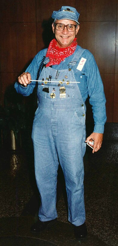 Combining both his hobbies in one Halloween costume, Bob Fletcher shows up as a railroad engineer and/or musical “conductor.”