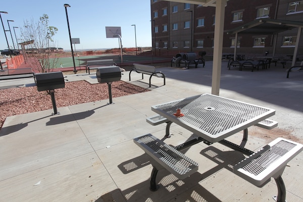 These barracks, located in Fort Carson, Colo., have been constructed in close proximity to Butts Army Airfield. The dorm-style buildings are comprised of 370,156 square feet, and are equipped with individual bathrooms and kitchenettes. The recreational areas situated behind the barracks buildings have facilities for sports, barbecuing, as well as indoor community recreation facilities.