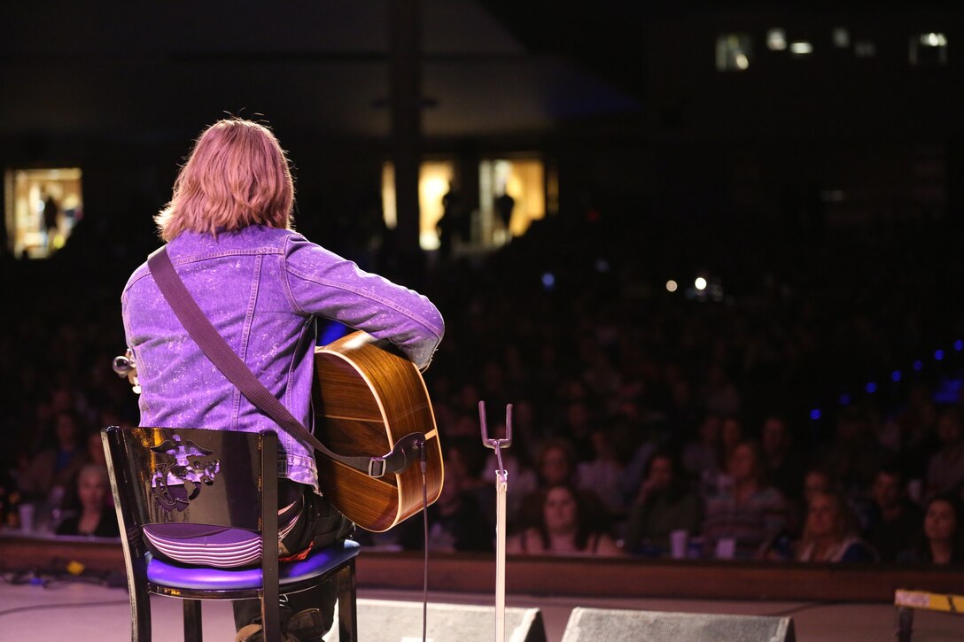 Joey Hyde sings and plays the guitar for a crowd of more than 1,800 people during the 6th Annual Guitar Pull at Marine Corps Air Station Cherry Point, N.C., Nov. 19, 2014. Hyde is a country music artist and native of Grand Rapids, Mich.