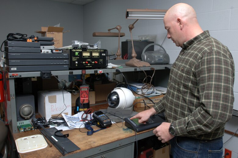 Henry Mare works on an electronics test station Nov. 24, 2014 at the U.S. Army Corps of Engineers Nashville District Hydropower Branch's Electronics Service Section located at Old Hickory Dam in Hendersonville, Tenn.  Mare recently transitioned out of the U.S. Army at Fort Campbell, Ky., and has been working as an intern. The Corps recently selected him for a position as an electronics technician.