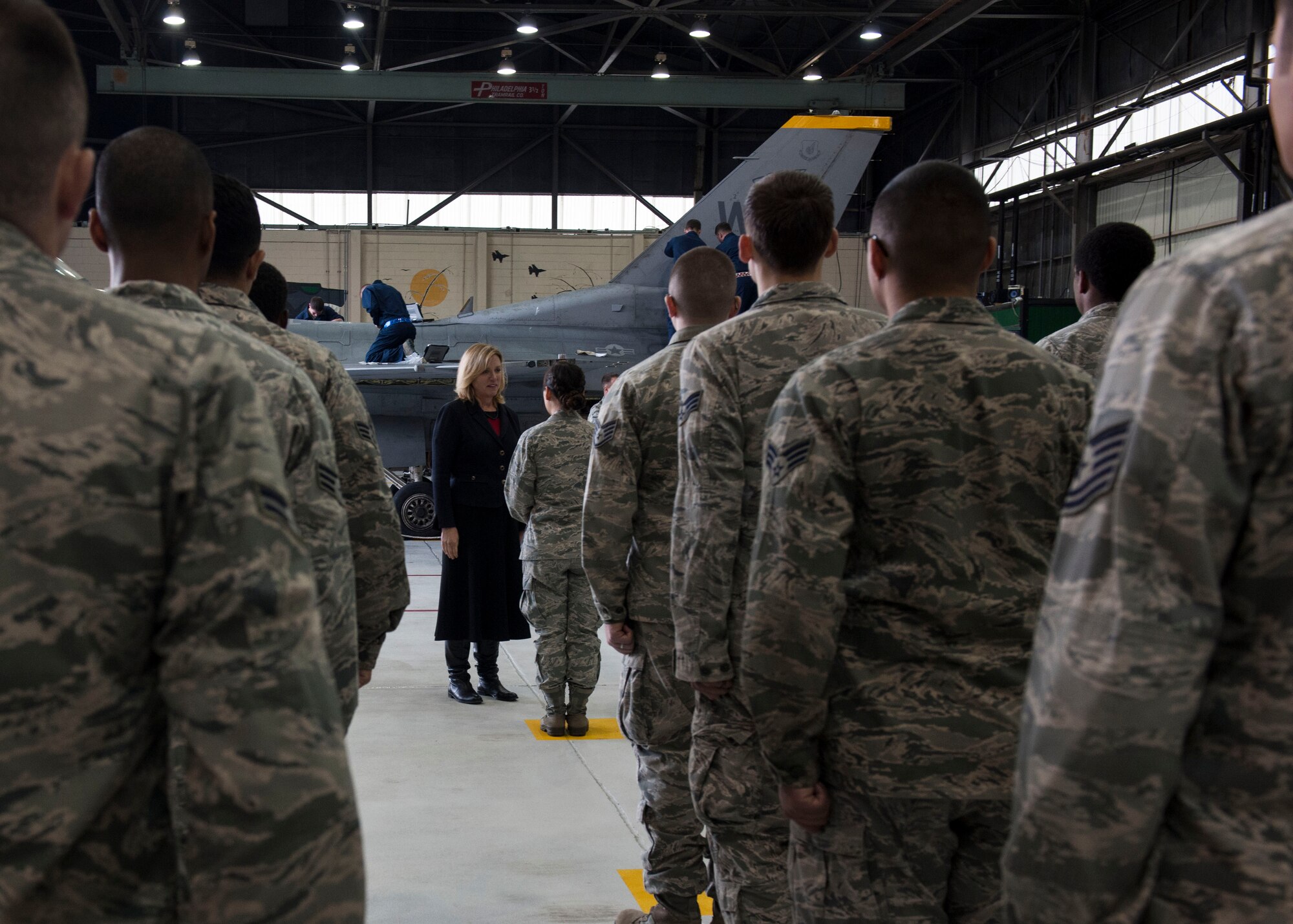 Secretary of the Air Force Deborah Lee James talks to 8th Aircraft Maintenance Squadron Airmen during her first visit to  Kunsan Air Base, Republic of Korea, Nov. 22, 2014. James’ first visit to Kunsan was part of her on-going Pacific Command base visits, which includes stops in Alaska, Hawaii, Guam, Japan and the ROK. (U.S. Air Force photo by Senior Airman Katrina Heikkinen/Released) 