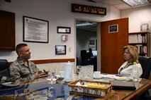 Secretary of the Air Force Deborah Lee James talks with Col. Brook Leonard, 51st Fighter Wing commander, Nov. 24, 2014, at Osan Air Base, Republic of Korea. Leonard gave James a briefing about the mission and priorities of Osan AB. (U.S. Air Force photo by Staff Sgt. Jake Barreiro)