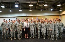 Secretary of the Air Force Deborah Lee James pauses for a photo with Airmen at the Ginko Tree Dining Facility Nov. 24, 2014, at Osan Air Base, Republic of Korea. James talked with Airmen over breakfast about the current challenges in today’s Air Force. (U.S. Air Force photo by Staff Sgt. Jake Barreiro)