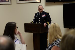 U.S. Army Maj. Gen. Ross Ridge, U.S. Army Initial Military Training Center of Excellence deputy commanding general, welcomes Gold Star family members during the Thanks for Giving potluck social at the Lakeside Grill at Fort Eustis, Va., Nov. 20, 2014. The event has been hosted by Army Support Activity Survivor Outreach Services for the past four years. (U.S. Air Force photo by Staff Sgt. Teresa J. Cleveland/Released)