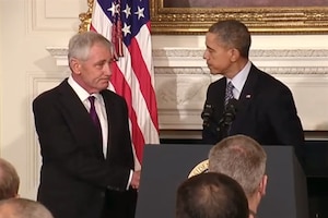 Defense Secretary Chuck Hagel shakes hands with President Barack Obama at the White House Nov. 24, 2014. The president announced that Hagel would resign his position as defense secretary. (Courtesy photo )
