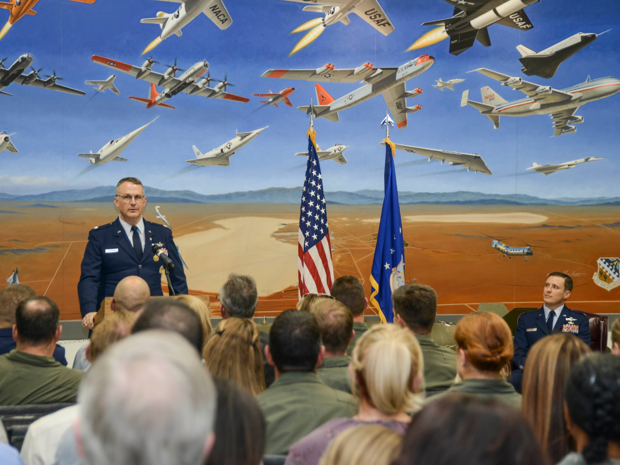 Lt. Col. Michael T. Morgan speaks to the audience during his retirement ceremony at the Air Force Flight Test Museum Nov. 21. (U.S. Air Force photo by Rebecca Amber)