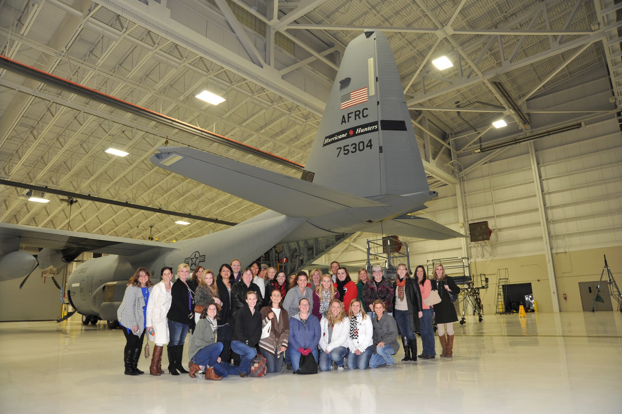 Keesler Spouse’s Club members toured a WC-130J Nov. 18, 2014, at Keesler Air Force Base, Mississippi. The WC-130J is used by the 53rd Weather Reconnaissance Squadron to gather weather data for the National Hurricane Center in Miami. They also received a 53rd WRS mission briefing prior to the tour of the aircraft. The Keesler Spouse Club typically meets on the second Tuesday of each month. Membership is open to spouses of any Armed Forces service member, including active duty, Guard or Reserve, spouses of civil service or key civilian personnel working at Keesler. For more information, visit http://www.keeslerspousesclub.org/membership. (U.S. Air Force photo/Maj. Marnee A.C. Losurdo)