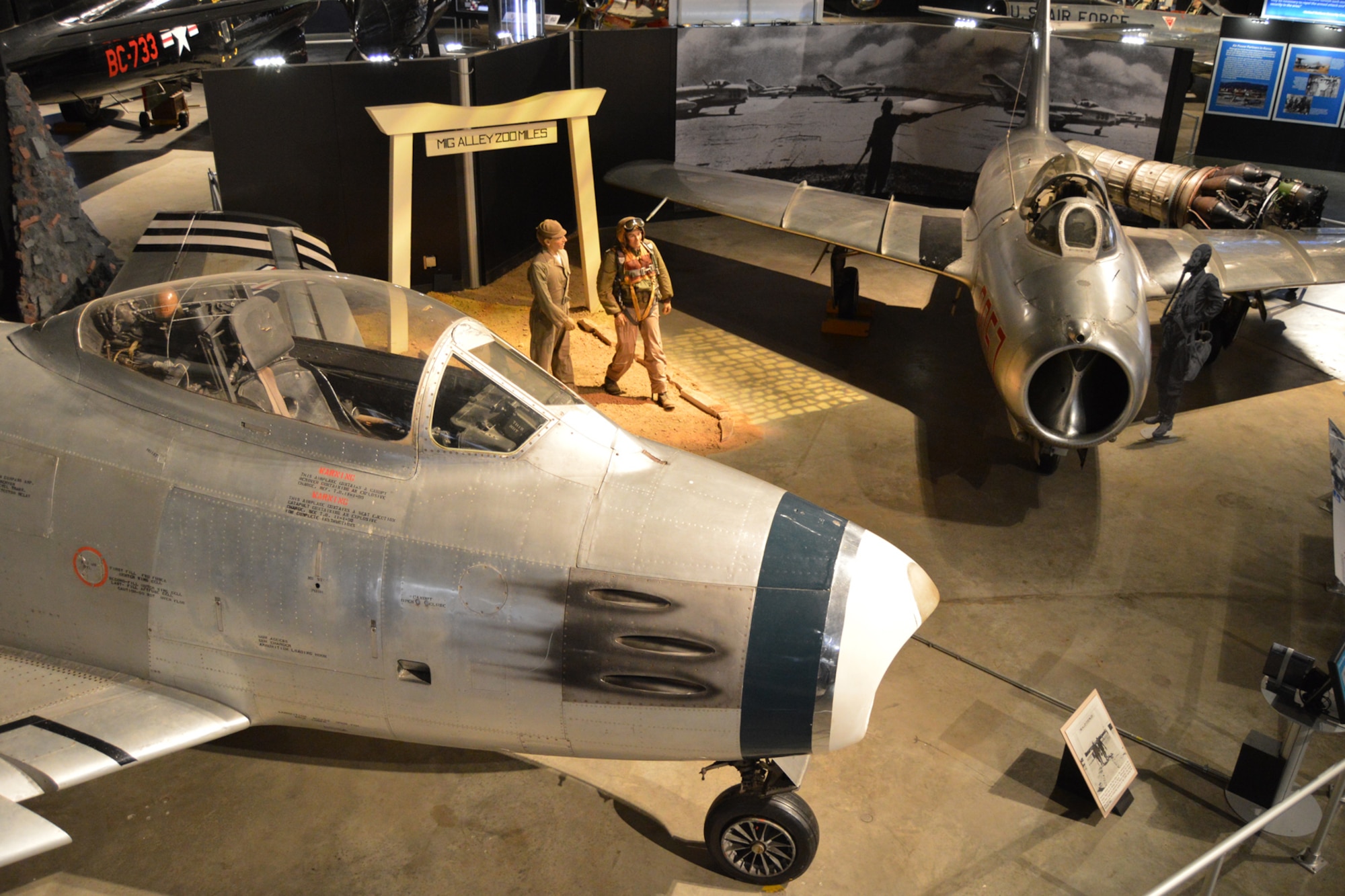 DAYTON, Ohio -- North American F-86A Sabre (left) on display with the Mikoyan-Gurevich MiG-15 in the Korean War Gallery at the National Museum of the United States Air Force. (U.S. Air Force photo)
