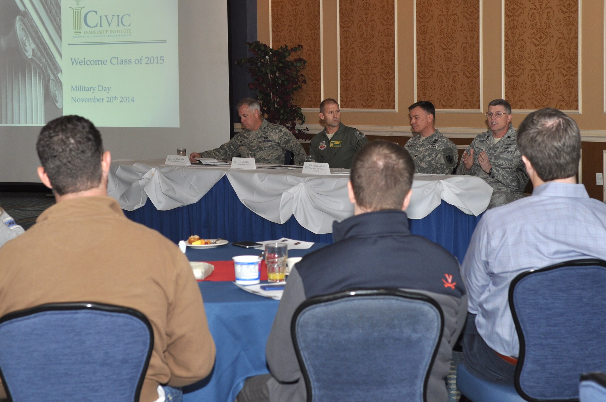 U.S. Air Force Col. John J. Allen Jr., 633rd Air Base Wing commander, Col. Kevin Huyck, 1st Fighter Wing commander, U.S. Army Col. William Galbraith, 733rd Mission Support Group commander, and U.S. Air Force Lt. Col. David Stevens, 480th Intelligence, Surveillance and Reconnaissance Wing director of staff, answer questions during the CIVIC Leadership Institute Military Day Nov. 20, 2014, at the Bayview Commonwealth Center at Langley Air Force Base, Va. The event was held to strengthen community bonds and share JBLE’s mission and impact on Hampton Roads. (U.S. Air Force photo by Master Sgt. April Wickes/Released)