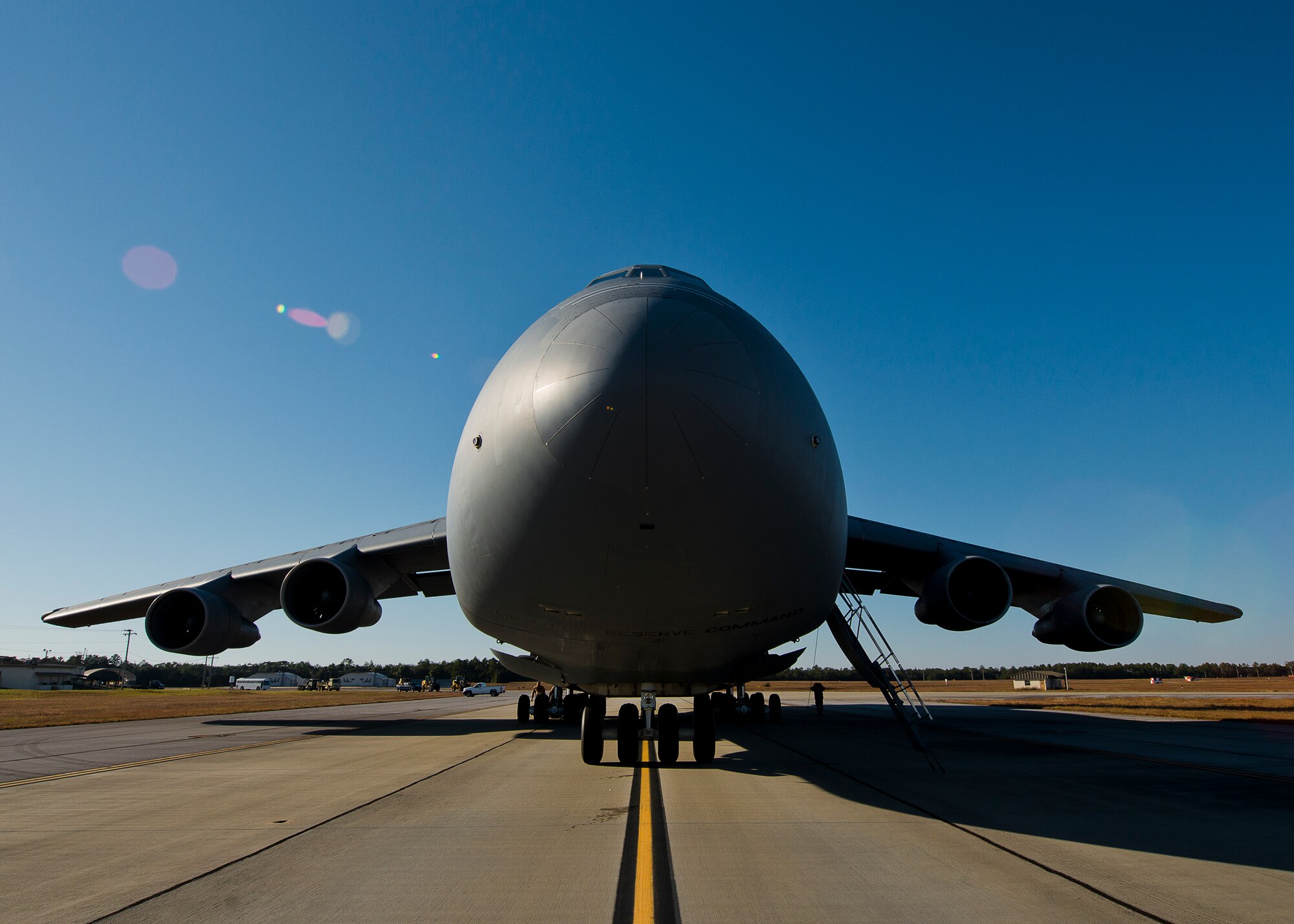 A 433rd Airlift Wing C-5 Galaxy sits on the flight line prior to offloading  its passengers and cargo at Eglin Air Force Base, Fla.   The reserve aircrew of the C-5 is from Joint Base San Antonio.  (U.S. Air Force photo/Samuel King Jr.)