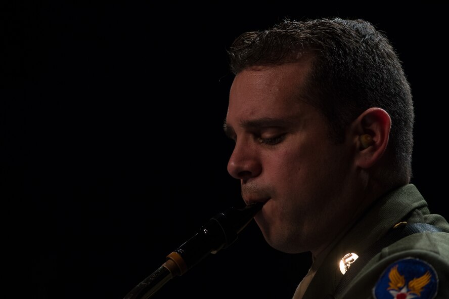 Staff Sgt. Lencys Esteban-Nunez, regional saxophonist for the U.S. Air Forces in Europe Band, plays a song during a Battle of the Bulge 70th anniversary commemoration event, Nov. 22, 2014, in Bastogne, Belgium. The USAFE Band played throughout Europe since September stopping at villages that were affected by the battle. The band featured approximately 20 songs from the 1940s, bringing joy and nostalgia to the audience. (U.S. Air Force photo/Senior Airman Jonathan Stefanko)