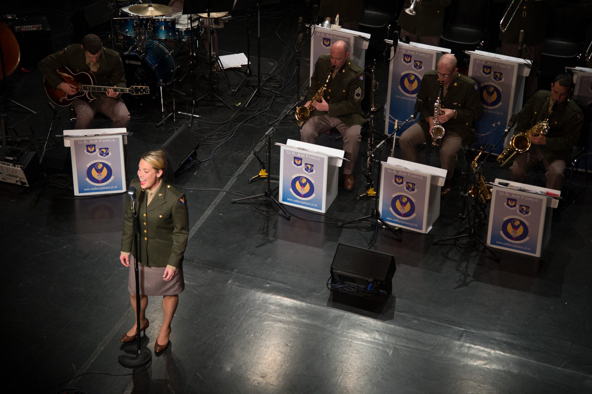 The U.S. Air Forces in Europe Band performs during a Battle of the Bulge 70th anniversary commemoration event, Nov. 22, 2014, in Bastogne, Belgium. The USAFE Band played throughout Europe since September stopping at villages that were affected by the battle. The band featured approximately 20 songs from the 1940s, bringing joy and nostalgia to the audience. (U.S. Air Force photo/Senior Airman Jonathan Stefanko)