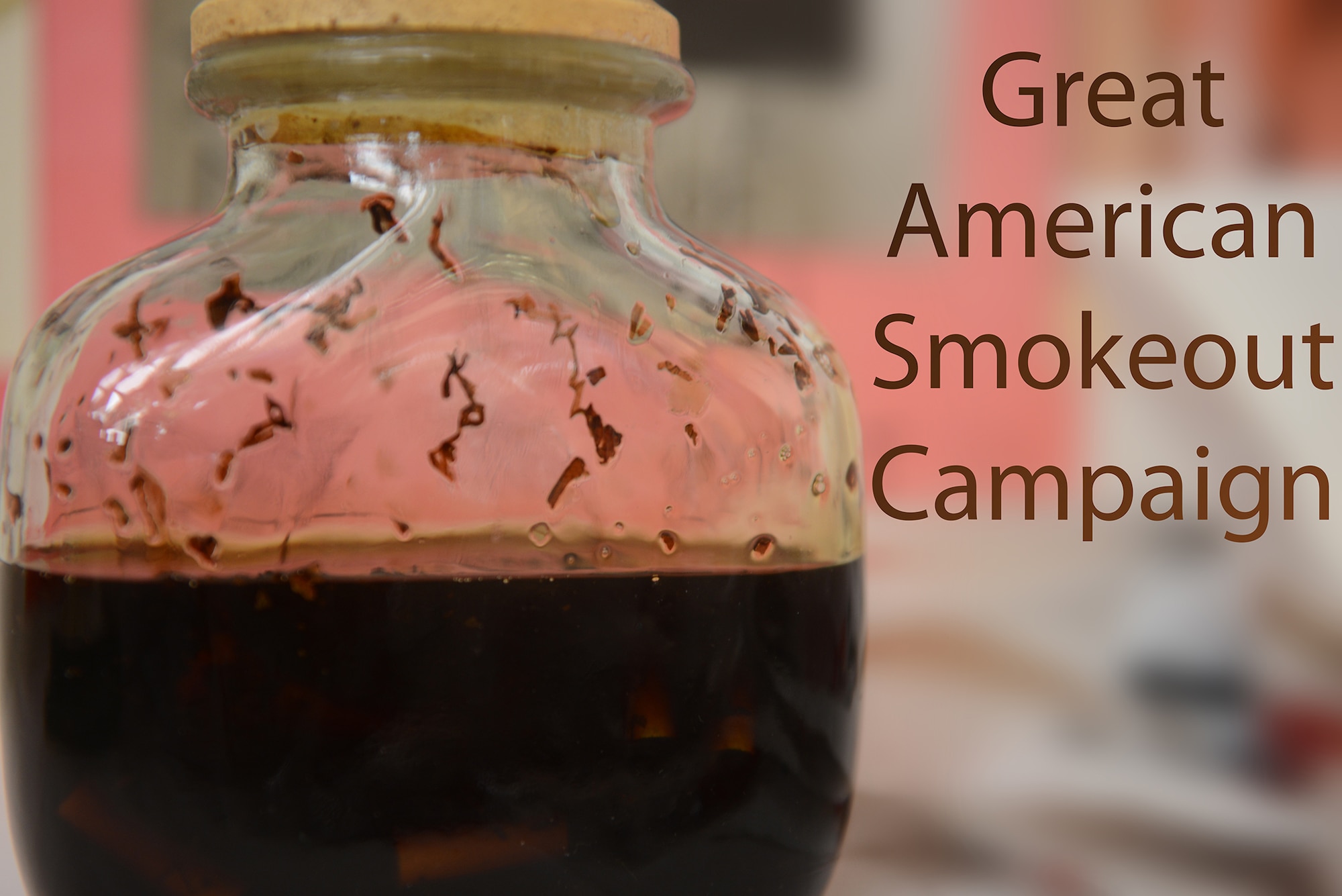 A jar full of tar that represents the accumulation of tar a smoker builds in their lungs each year they smoke sits on a table at the Great American Smokeout Campaign booth at Yokota Air Base, Japan, Nov. 20, 2014. The event is an annual campaign aimed at educating people about the hazards of smoking and informing them of quitting options. (U.S. Air Force graphic by Airman 1st Class David C. Danford/Released)